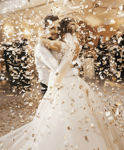 Romantic wedding dance surrounded by confetti